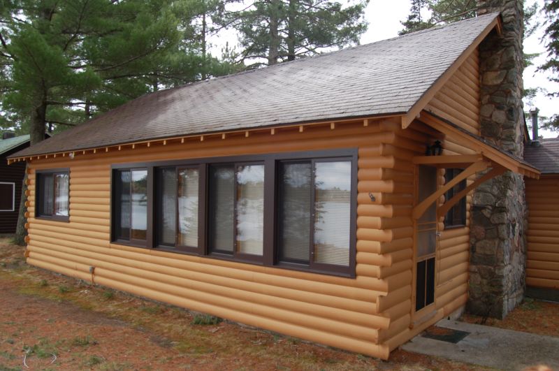 Log Home Staining in Spring